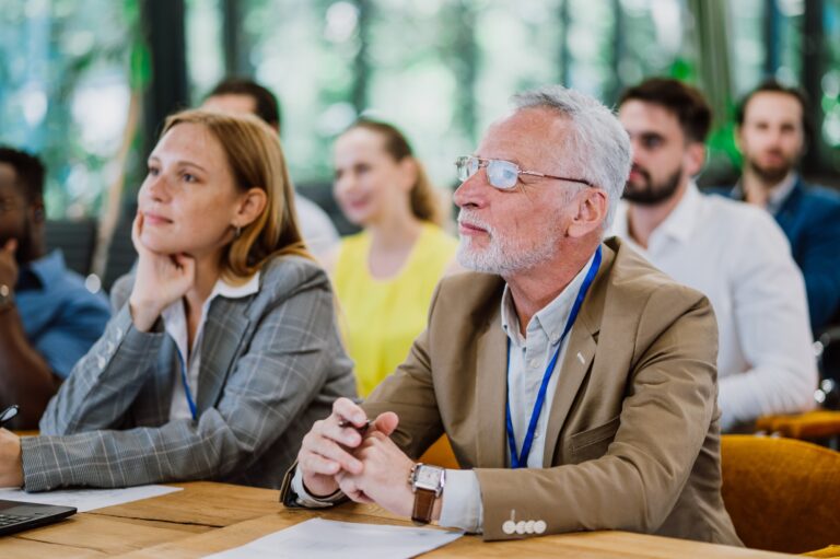 Cinematic image of a conference meeting.